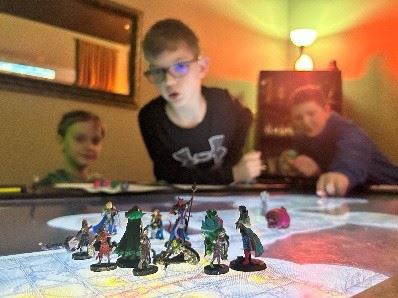 Image of kids playing Dungeons and Dragons